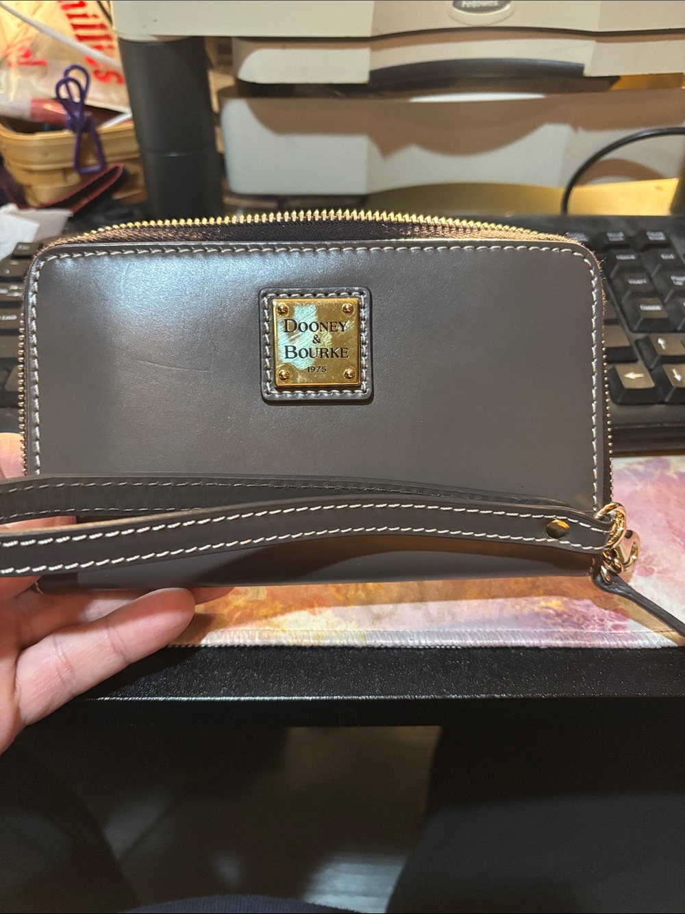 Dooney & Bourke Gray Leather Wristlet with Gold Logo Plaque
